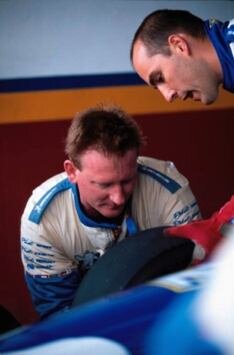 Pit stop wheel-change workshop on a Formula 3 car